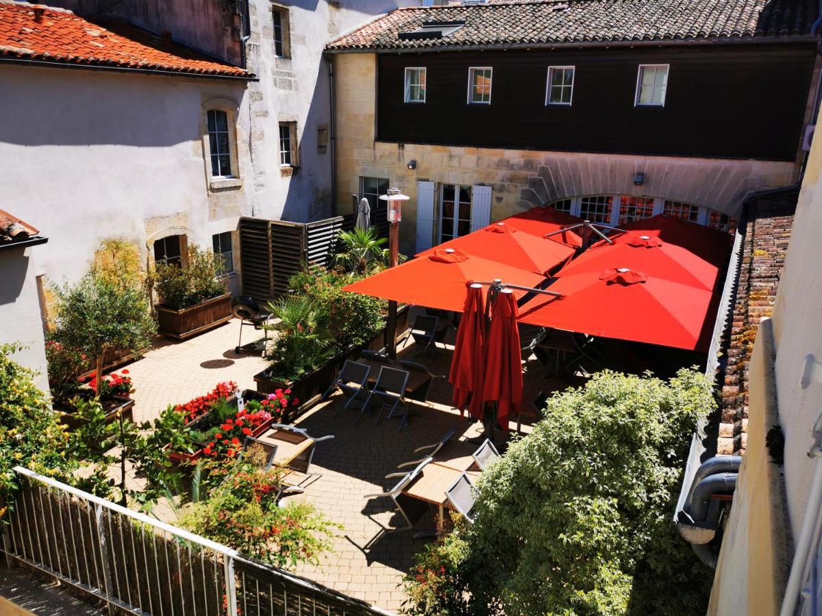 Hotel Restaurant Le Lion D'Or Gemozac Bagian luar foto